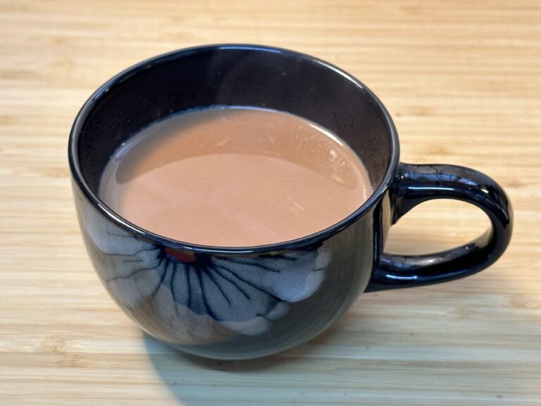 A steaming cup of Ginger Masala Tea.